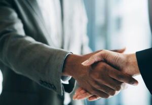 Two people shaking hands