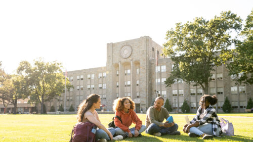 College students on a university lawn.