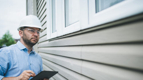 A property inspector looking at a home.