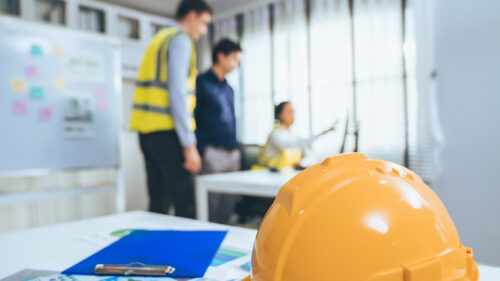 A hard hat on a table in a job site