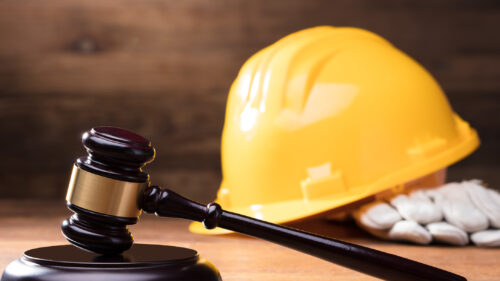 A gavel and a hard hat