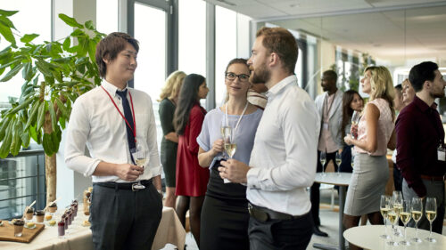 A group of professionals at a happy hour.